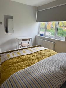 Ένα ή περισσότερα κρεβάτια σε δωμάτιο στο COSY Rooms