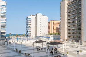 a view of a city with tall buildings at Relájate en pareja o familia!!! in Tavernes de Valldigna