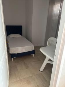Ένα ή περισσότερα κρεβάτια σε δωμάτιο στο Cosy appartement