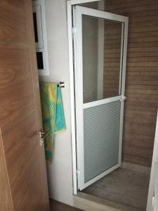 a door with a window in a room at Studio Charmant & Cosy à Agdal in Gare de Rabat-Aguedal