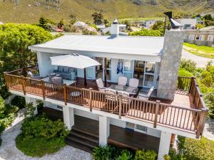an aerial view of a house with a deck at Klein Paradys in Kleinmond