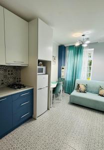 Η κουζίνα ή μικρή κουζίνα στο Апартаменти La Storia