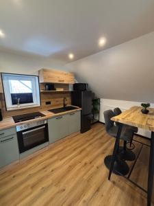 Kuchyň nebo kuchyňský kout v ubytování Idyllische Ferienwohnung