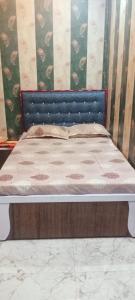 Postel nebo postele na pokoji v ubytování Hotel Om