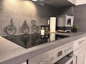 a kitchen with a counter top with a coffee maker at Apartment-Topnik Datteln in Datteln