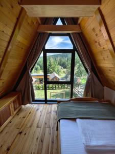 Postel nebo postele na pokoji v ubytování Mountain house Popović Tara
