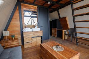 a room with a bed and a table in a room at Shambhala Holistic Resort Only Adults in Manzanillo