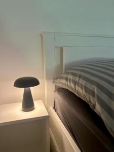 Postel nebo postele na pokoji v ubytování Loft19