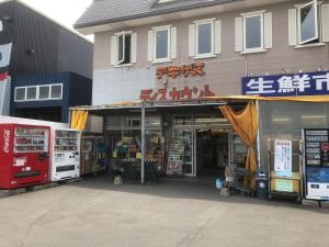 a store front of a store in an asian city at Kushiro - House - Vacation STAY 20411 in Irifunechō