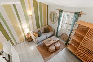 Ένα ή περισσότερα κρεβάτια σε δωμάτιο στο Cozy studio Le Cèdre, Port de Saint Tropez