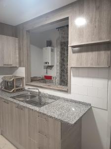 Η κουζίνα ή μικρή κουζίνα στο Appartement hyper centre avec vue exceptionnelle de Hammamet