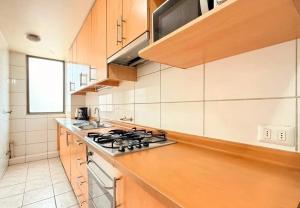 Kuchyň nebo kuchyňský kout v ubytování Departamento Avenida Providencia