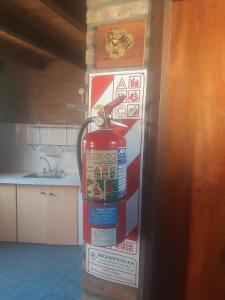 ein Hydrant in der Ecke einer Küche in der Unterkunft La casa de Milac in Mina Clavero