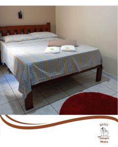 Postel nebo postele na pokoji v ubytování Hotel Estalagem Mineira Cambuí MG