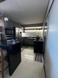 Køkken eller tekøkken på Duplex Família cofort premium