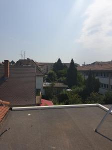 a view of a parking lot with a roof at Chambre in Schiltigheim +2 photos