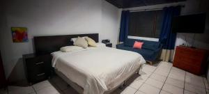 Ένα ή περισσότερα κρεβάτια σε δωμάτιο στο Habitación Lomas de San Francisco