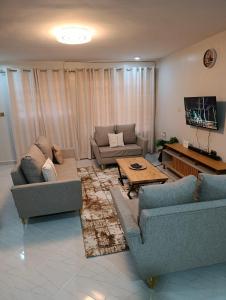 Χώρος καθιστικού στο Emraan Residence