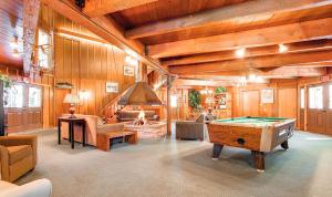 a large room with a pool table in it at Park Meadows 7D by Ski Country Resorts in Breckenridge
