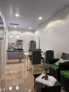 a living room with a couch and a table at Two-bedroom apartment CDE - Area 4 - Close to everything in Ciudad del Este