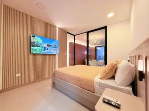 TV a/nebo společenská místnost v ubytování Suite de Lujo Plaza Noah