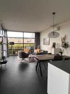 Posezení v ubytování Enkhuizer Strand Chalet am IJsselmeer Haus Nr 226