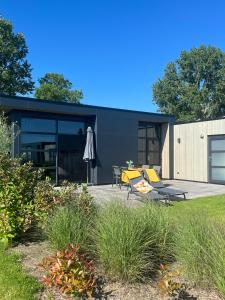 Zahrada ubytování Enkhuizer Strand Chalet am IJsselmeer Haus Nr 226