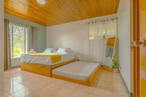 Ένα ή περισσότερα κρεβάτια σε δωμάτιο στο Gray Oasis, Private Pool +31 φωτογραφίες