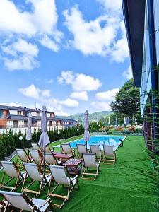 Πισίνα στο ή κοντά στο FamilyKop Apartments Milmari