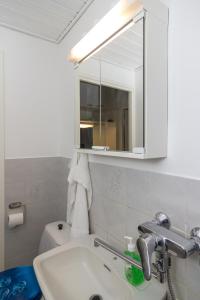 Ванная комната в Santa's City Apartments