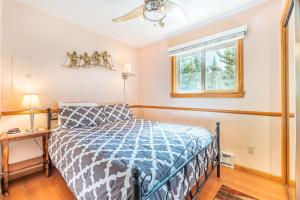 a bedroom with a bed and a window at Park Meadows 6A by Ski Country Resorts in Breckenridge
