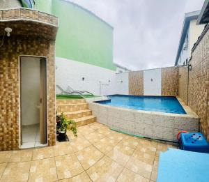 Swimmingpoolen hos eller tæt på Casa Praia e hostel