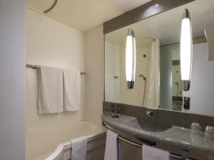 Koupelna v ubytování Hotel Novotel Evry Courcouronnes
