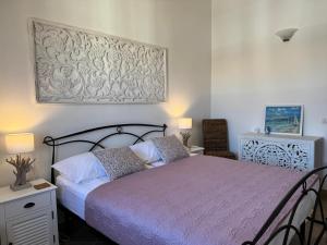 Postel nebo postele na pokoji v ubytování Casa Caterina - Spacious Sea-View Apartment