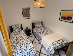 Postel nebo postele na pokoji v ubytování Maison de la liberté