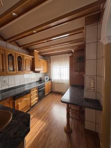 Η κουζίνα ή μικρή κουζίνα στο Casa Alcazaba +29 φωτογραφίες