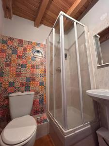 Koupelna v ubytování Casa Uishera