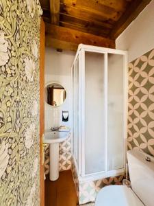 Koupelna v ubytování Casa Uishera