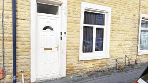Foto sihtkohas Burnley asuva majutusasutuse Stylish 3 bed home in Burnley by Lyx Stays, Ideal for Contractors, Weekend Getaways and Business Travellers - with Free Parking galeriist