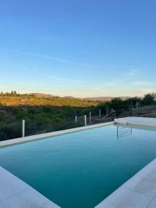 Swimmingpoolen hos eller tæt på URQU WAYRA