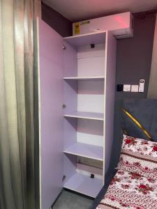 Ένα ή περισσότερα κρεβάτια σε δωμάτιο στο TID apartments