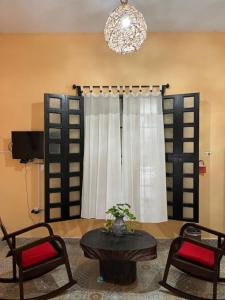 TV a/nebo společenská místnost v ubytování Casa Aluxes Hotel