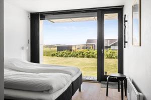 Postel nebo postele na pokoji v ubytování 284-Harboore-Bjergehusvej-8