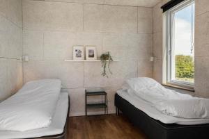 Postel nebo postele na pokoji v ubytování 284-Harboore-Bjergehusvej-8