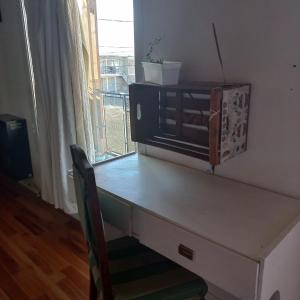 En eller flere senge i et værelse på Amplio Monoambiente semicéntrico Brizas del Sur