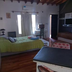 En eller flere senge i et værelse på Amplio Monoambiente semicéntrico Brizas del Sur