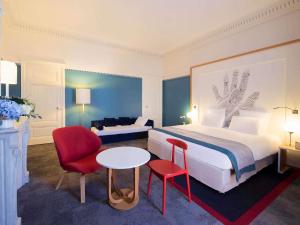 Postel nebo postele na pokoji v ubytování Mercure Lyon Centre Château Perrache