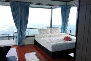 Ένα ή περισσότερα κρεβάτια σε δωμάτιο στο ไร่ผางาม ภูทับเบิก +31 φωτογραφίες