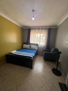 Postel nebo postele na pokoji v ubytování Vine suites