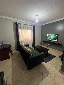 Μια τηλεόραση ή/και κέντρο ψυχαγωγίας στο Moon suites +11 φωτογραφίες